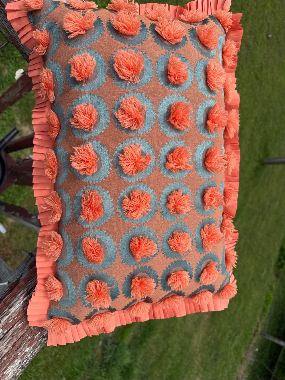 Decorative Coral Pom-Pom Accent Pillow with Teal Rosette Detail